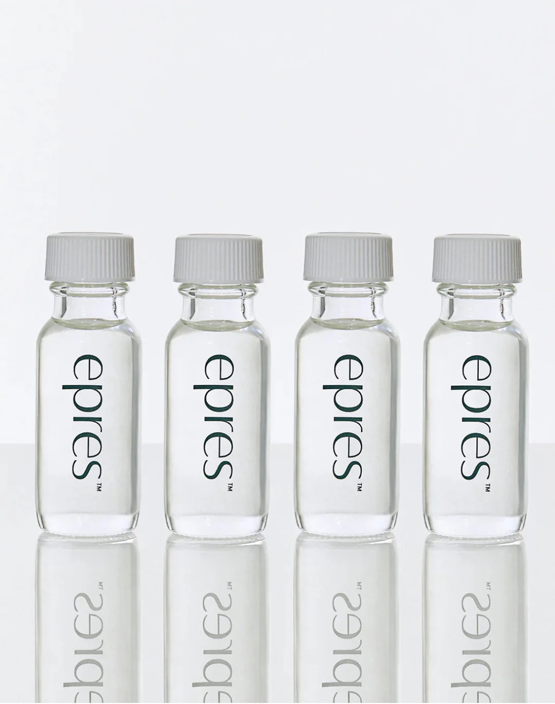 epres Bond Repair Concentrate refill vials on a clean reflective surface